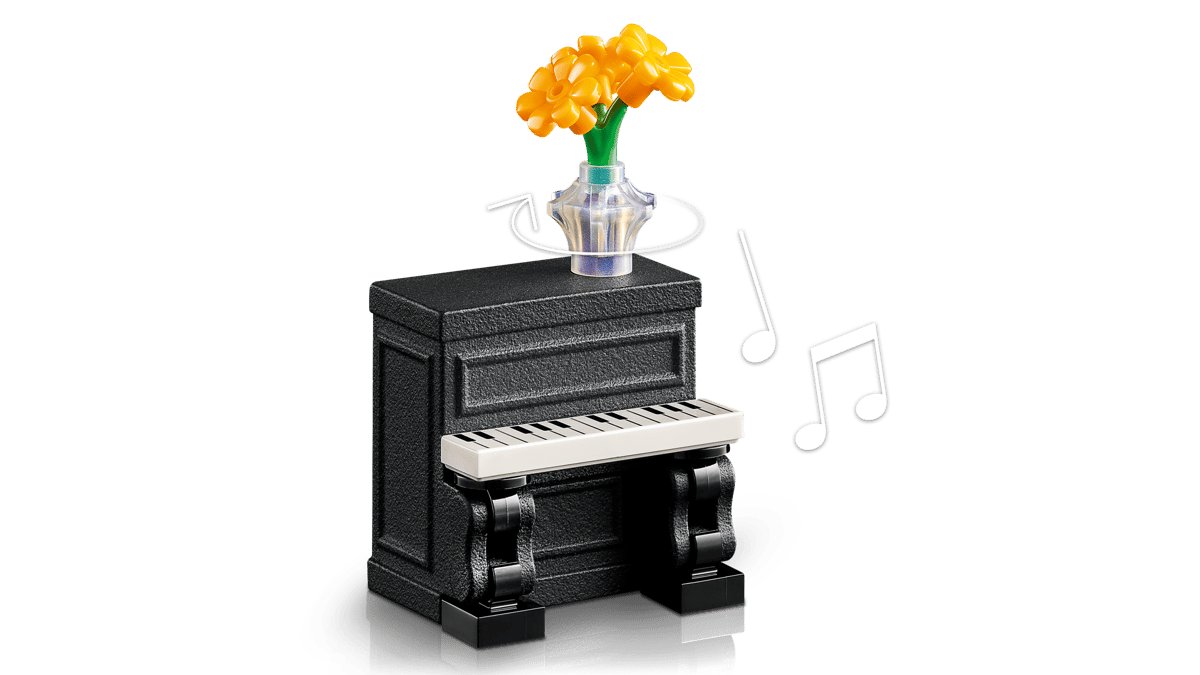 The 3D-printed street piano with a vase of yellow flowers on top