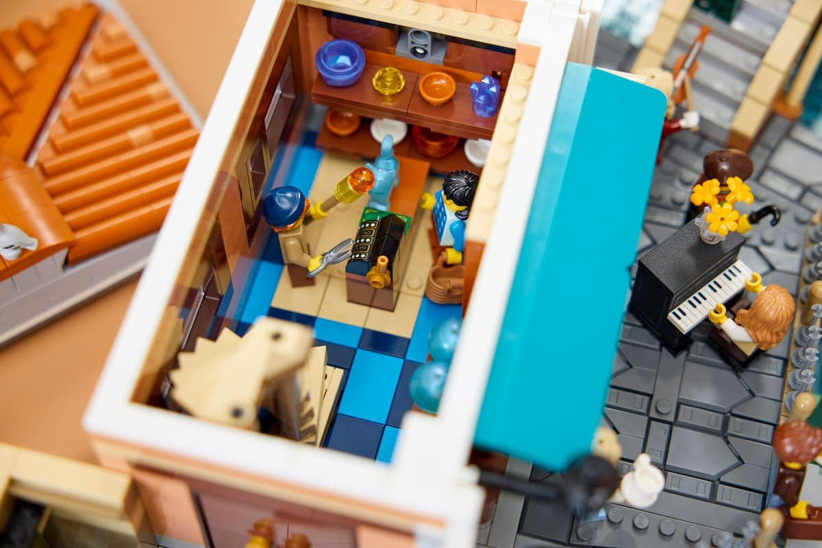Looking down into the glassblowing workshop with a minifigure playing the street piano outside