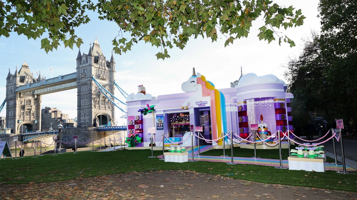 The LEGO Friends Unicorn Café pop-up at Potters Fields Park, London, with Tower Bridge in the background