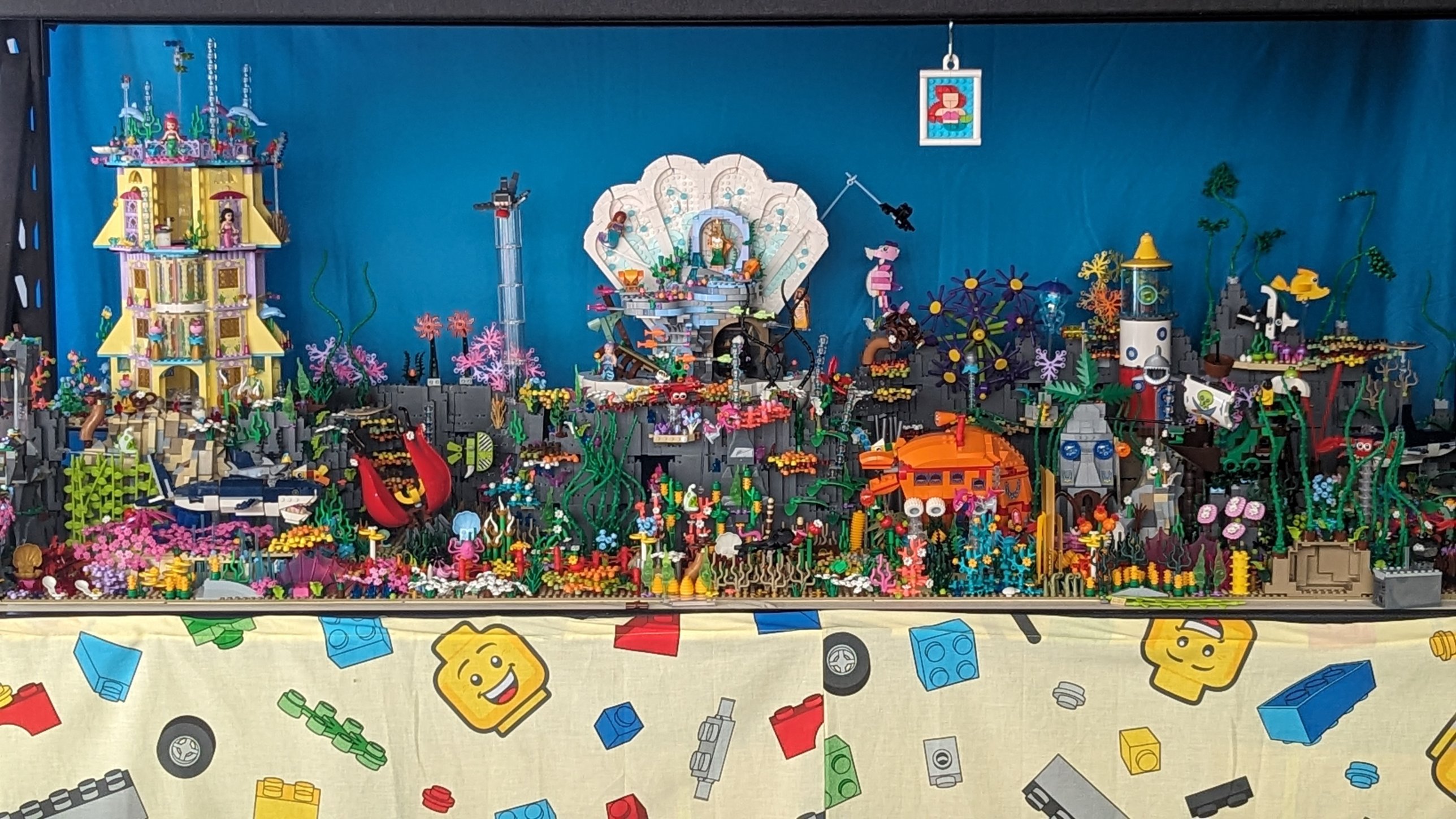 A colourful underwater LEGO display with a seashell palace, coral reefs and sea creatures